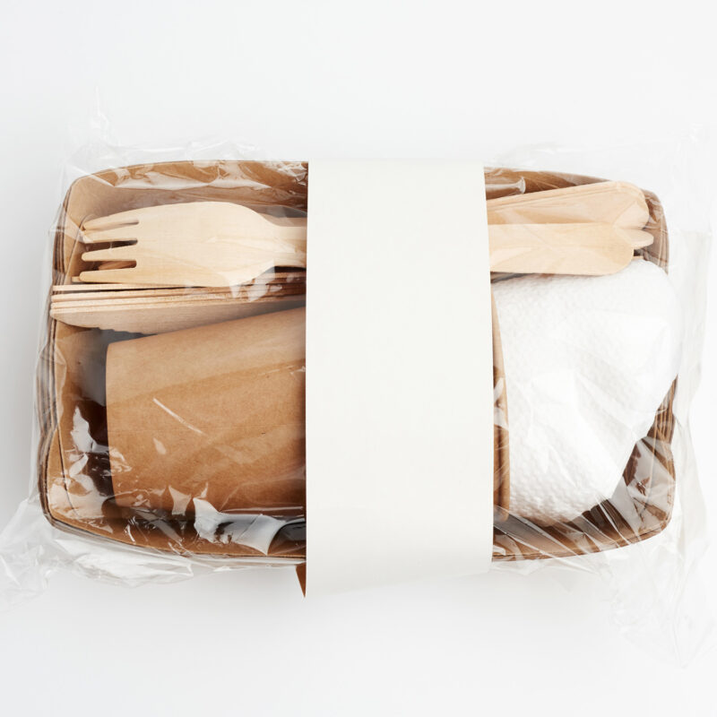 paper plates and cups from brown craft paper and wooden forks an